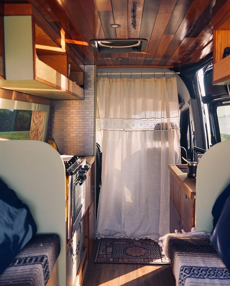  and an ICECO fridge/freezer unit. Perfect for road trips!|Rustic wooden countertop in an RV rental kitchen — photo 10