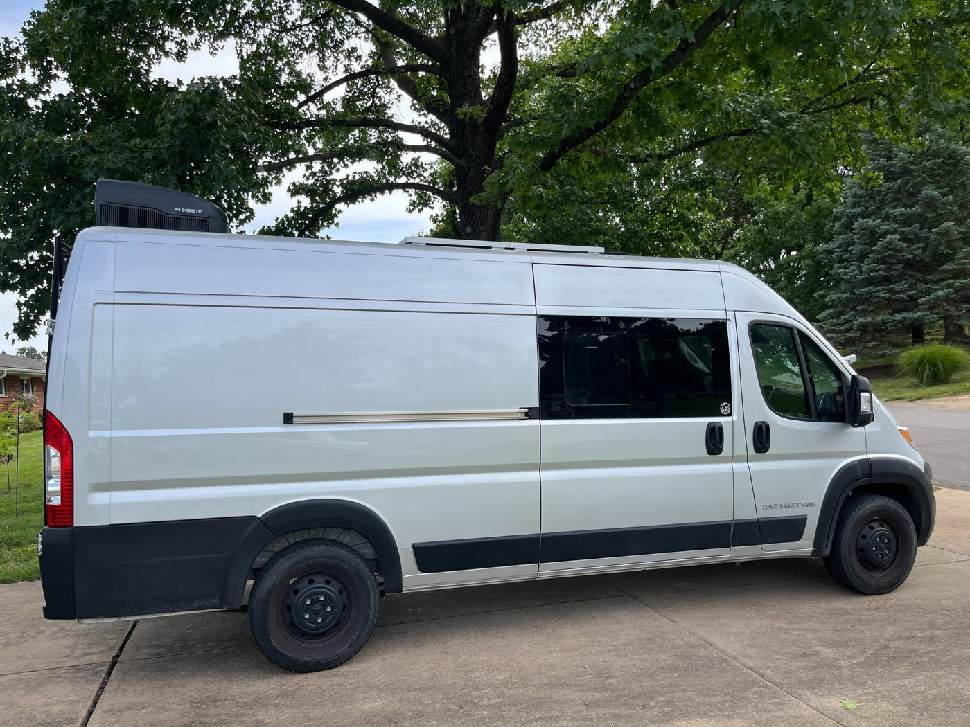 White "Dave & Matt Vans" RV rental camper van with Dometic AC & dark windows — photo 1