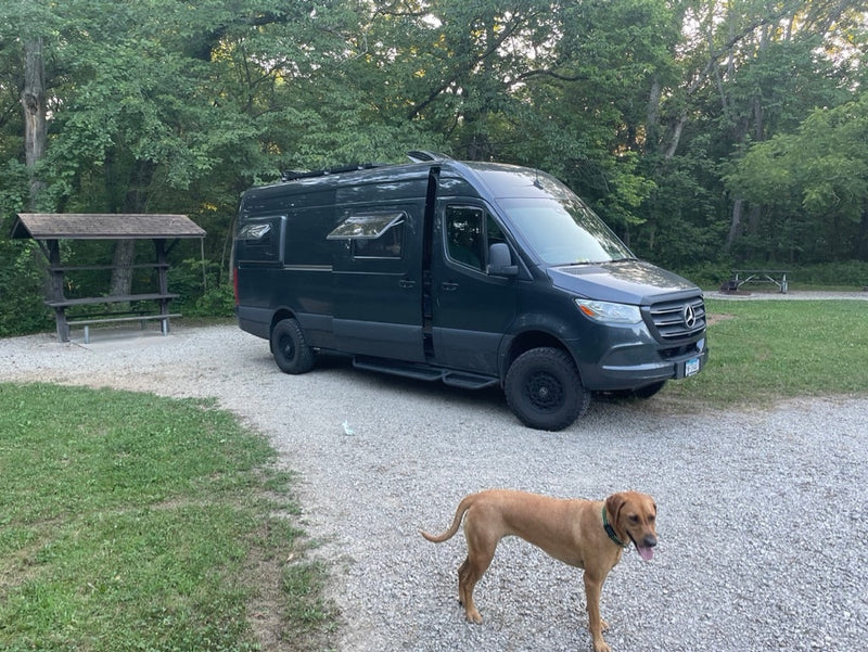  blender) and comfy bed. Ideal for van life adventures.|A dark grey Mercedes Sprinter camper van — photo 13