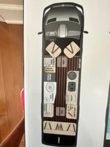 RV rental: Detailed floor plan of an RV's interior, showcasing its practical layout with bath, kitchen, and lounge.