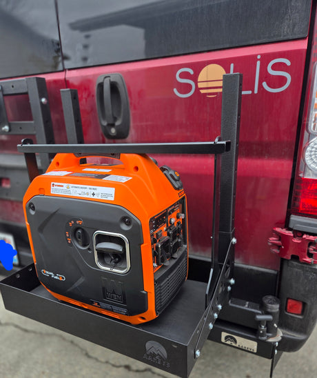 RV rental van with an orange WEN dual fuel generator mounted on the rear via an Aareys platform, ready for off-grid power.