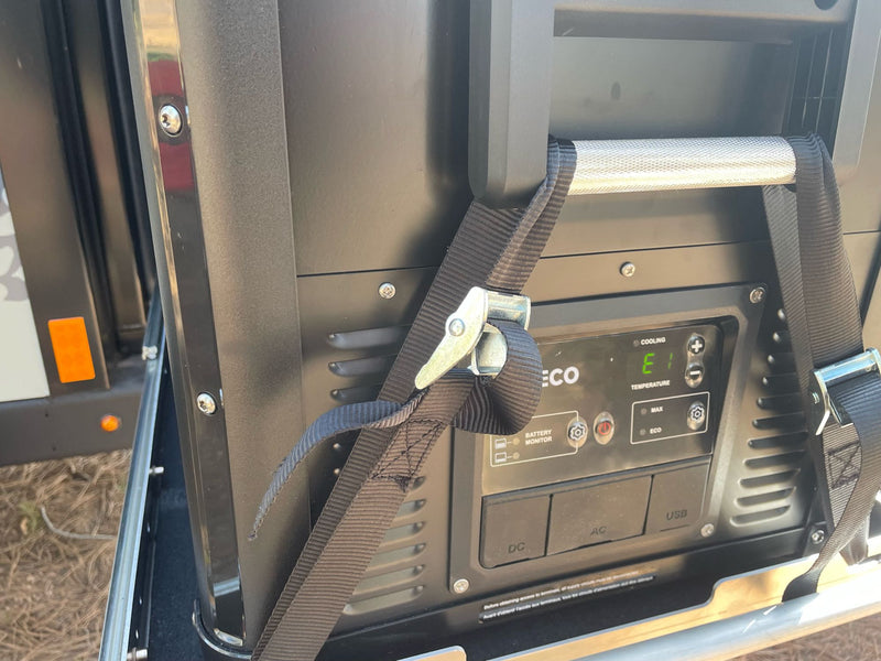 ideal for off-grid camping.|An RV rental's pull-out outdoor kitchen features a stove cooking — photo 10