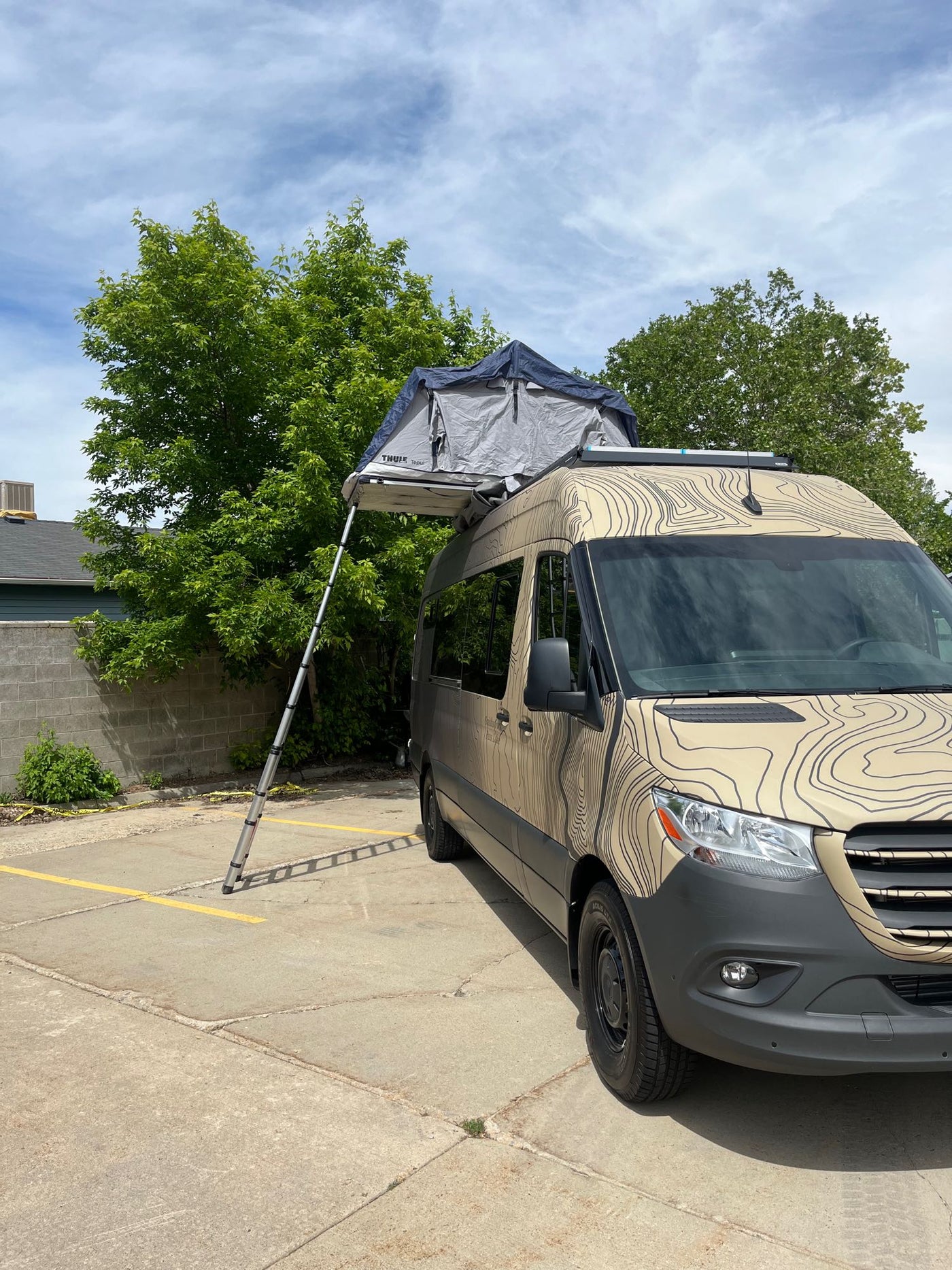 ready as an RV rental for your next adventure.|Custom Sprinter camper van with topo map wrap — photo 20