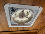 Maxxair fan in an RV rental camper provides essential ceiling ventilation for comfort on the road.