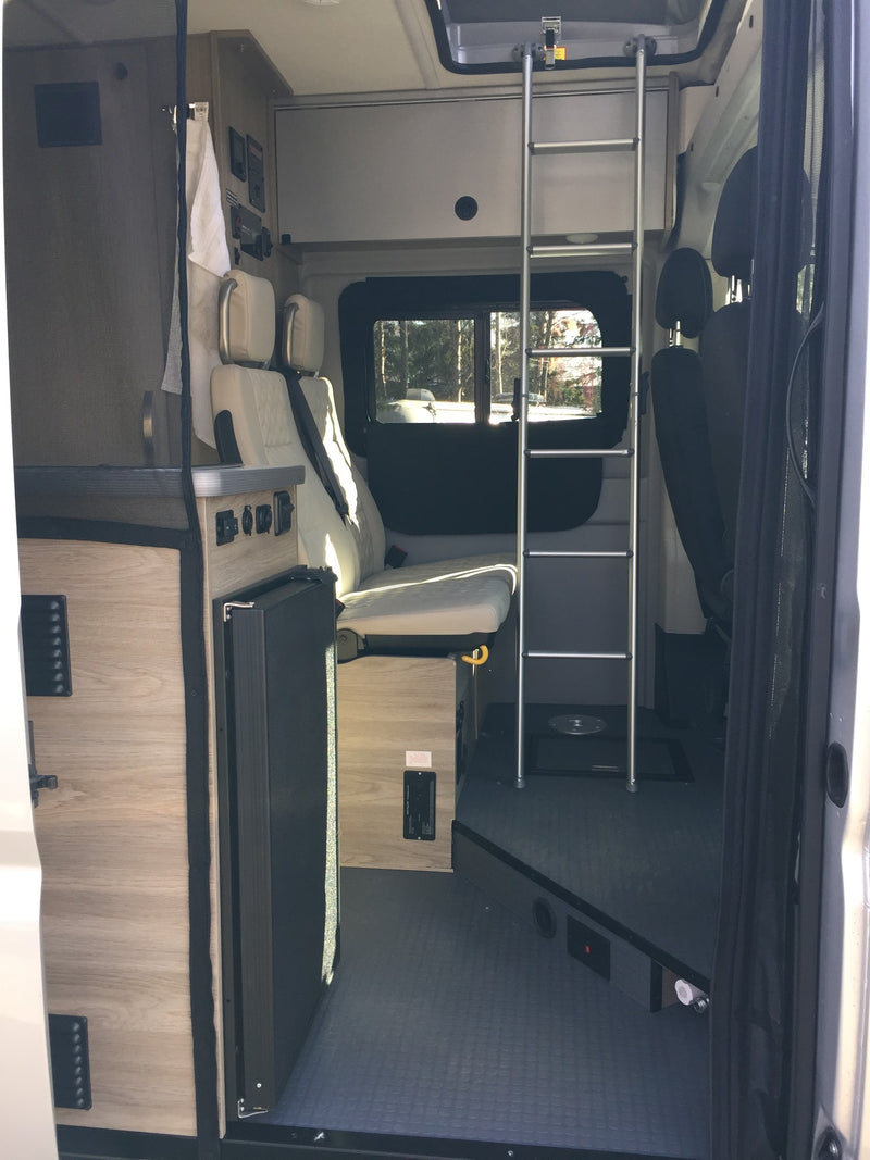  ready for your next adventure.|Spacious interior of an RV rental van — photo 4