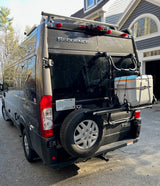 This Thor Sequence RV rental features a rear spare tire, cooler, and gear rack, plus a roof rack system.