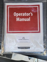 A 2023 Winnebago Solis RV operator's manual in a clear plastic bag, with model BUT59PX 15T253113314 visible. Ideal for rv rental.