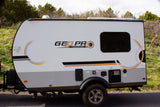 This compact white and grey GEO PRO travel trailer is ideal for an rv rental outdoor adventure.