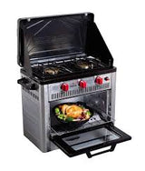 Compact RV rental camping kitchen: portable gas stove & oven with chicken inside. Ideal for trips.