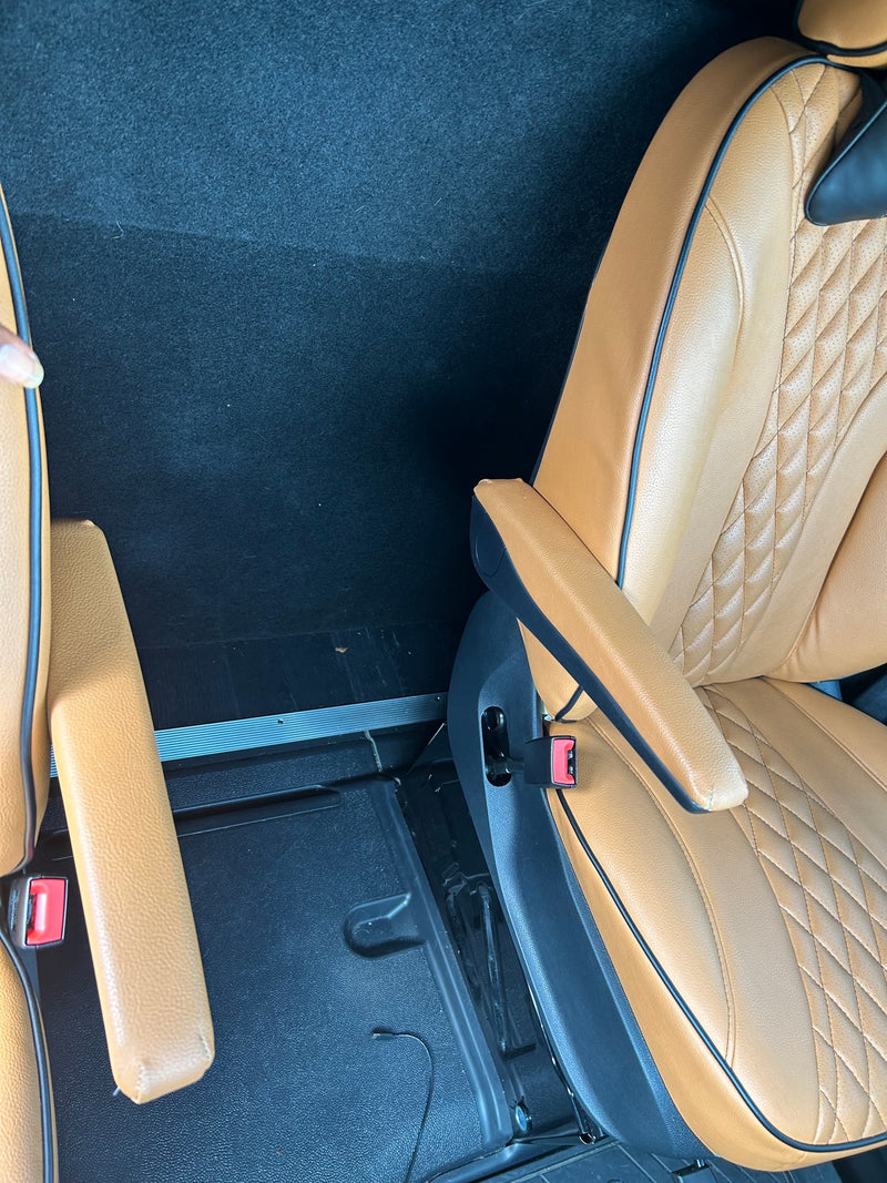  and steering wheel.|RV rental luxury: Dometic mini-fridge in a tan leather interior — photo 11