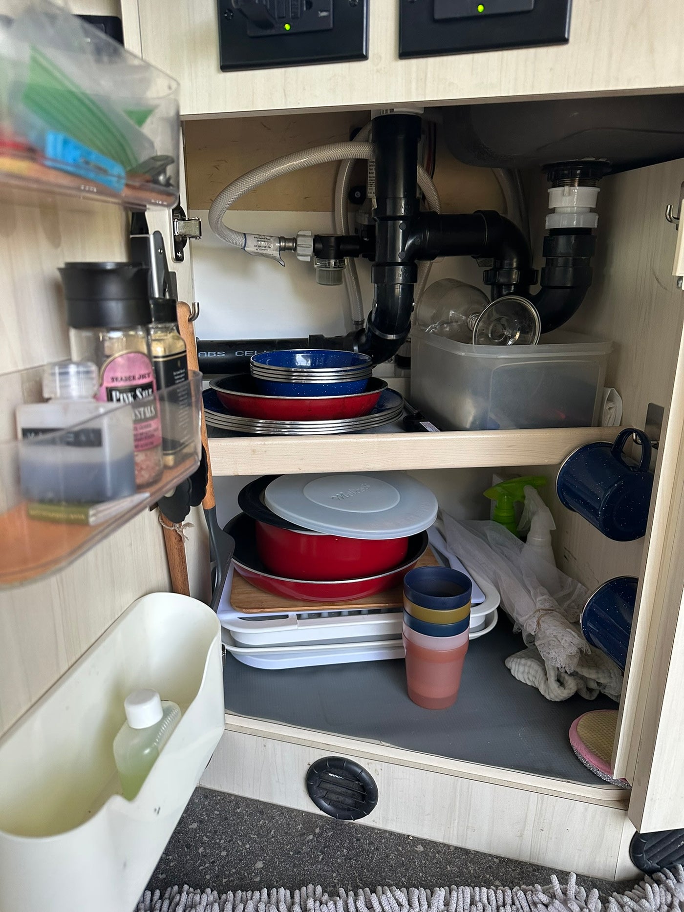  overlooking an ocean sunset.|Rear doors open on an rv rental camper van — photo 11