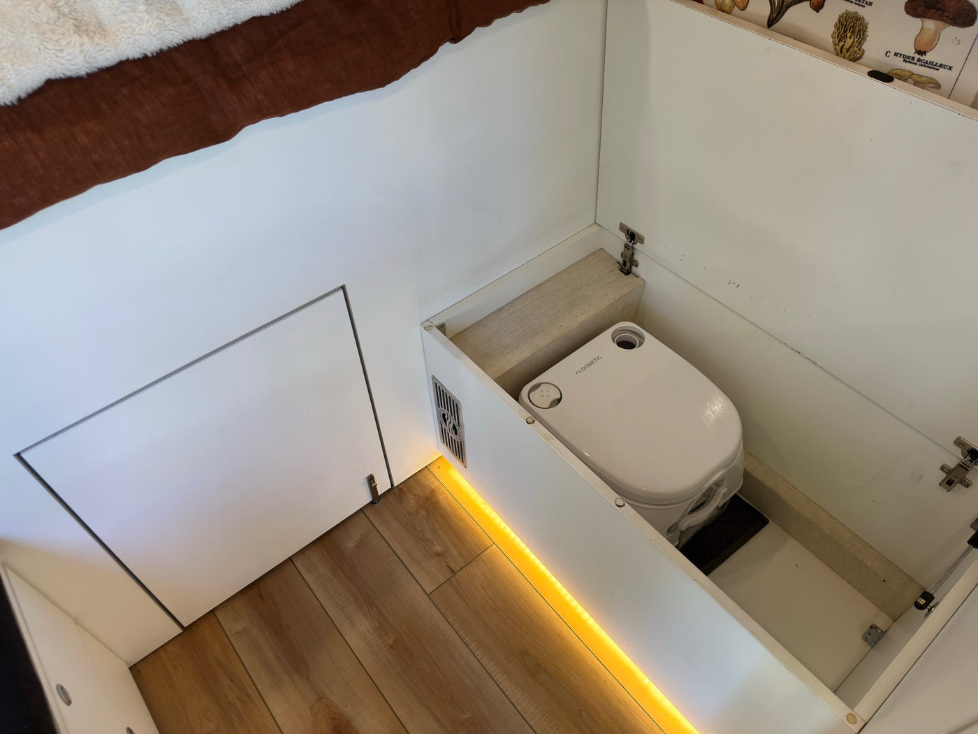  and seating area. Ideal for van life adventures.|Cozy Mercedes Sprinter RV rental set up for camping in a pine forest — photo 6