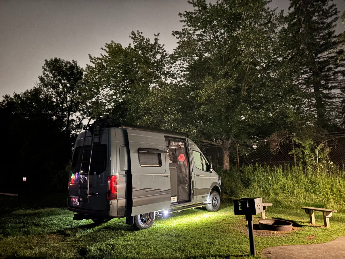 Experience nature with this lit-up grey RV rental