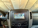 rv rental dashboard featuring a Sony infotainment system with Apple CarPlay playing The Beatles. Odometer: 198,667 miles.