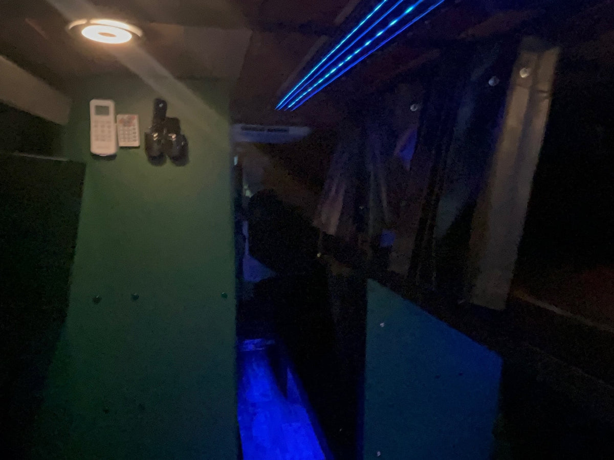 RV rental interior featuring green walls — photo 1