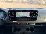 RV rental dashboard showing navigation in Albuquerque, climate controls, and instrument cluster details at 6:23 AM.