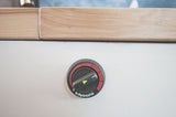 Close-up of a Webasto heater control dial inside an RV rental, currently set to off. Ensures comfort for your journey.