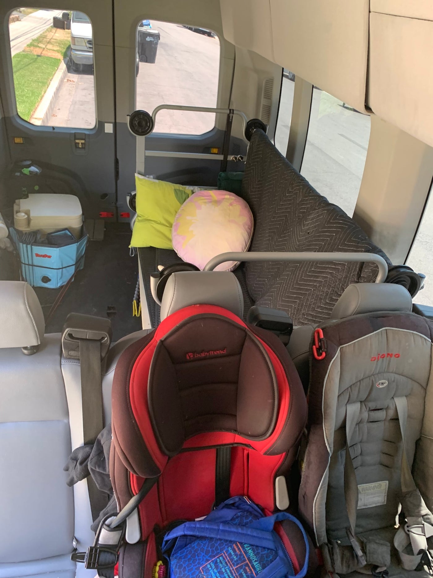  ideal for RV rental or group transport. Features large tinted windows & dark lower trim.|Young boy rests on a bunk in an RV rental — photo 20