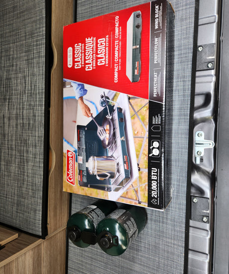 Coleman Classic 2-burner propane stove and fuel, ready for an **rv rental** adventure. Perfect for outdoor cooking!