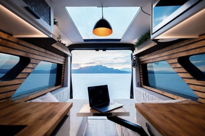 Experience luxury in an **RV rental**! A modern camper van interior with stunning views — photo 1