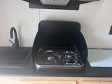  mobile living.|Two boys relax in an RV rental