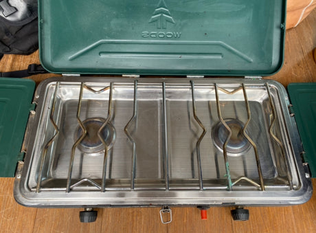 Open Woods dual burner camping stove, ideal for an RV rental. Perfect for outdoor meals on the go!