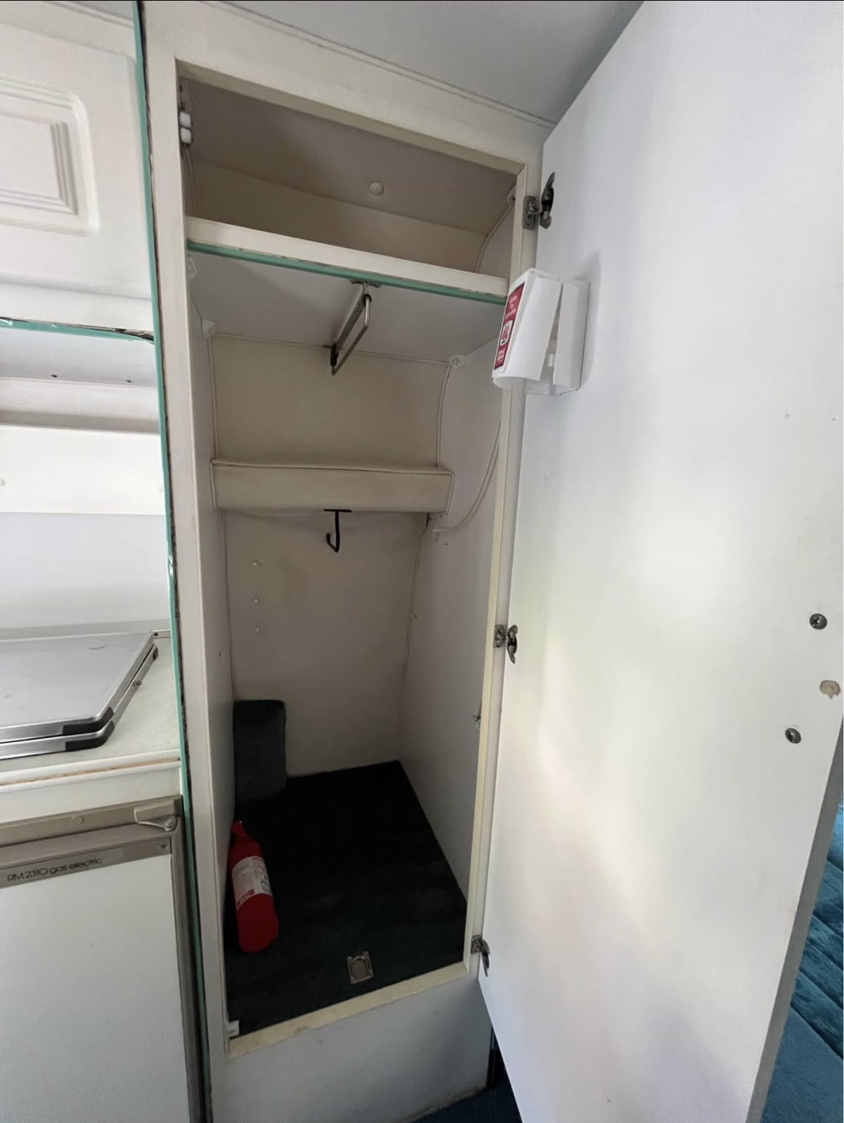  and kitchenette.|Interior view of an RV rental — photo 9