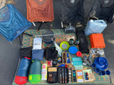 RV rental ready: complete camping setup with chairs, cooking gear, sleeping bags, and essentials for outdoor travel.