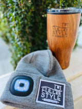 Fuller Style gear: a wooden-look tumbler & LED beanie, perfect for RV rental adventures & houseboats.