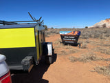 RV rental trailer at the White Pocket Recreation Area sign, Bureau of Land Management, Vermilion Cliffs National Monument.