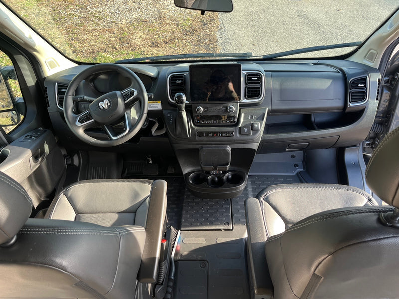 Spacious RV rental cockpit with modern dashboard, large infotainment screen, and comfortable seating, ideal for road trips. — photo 12