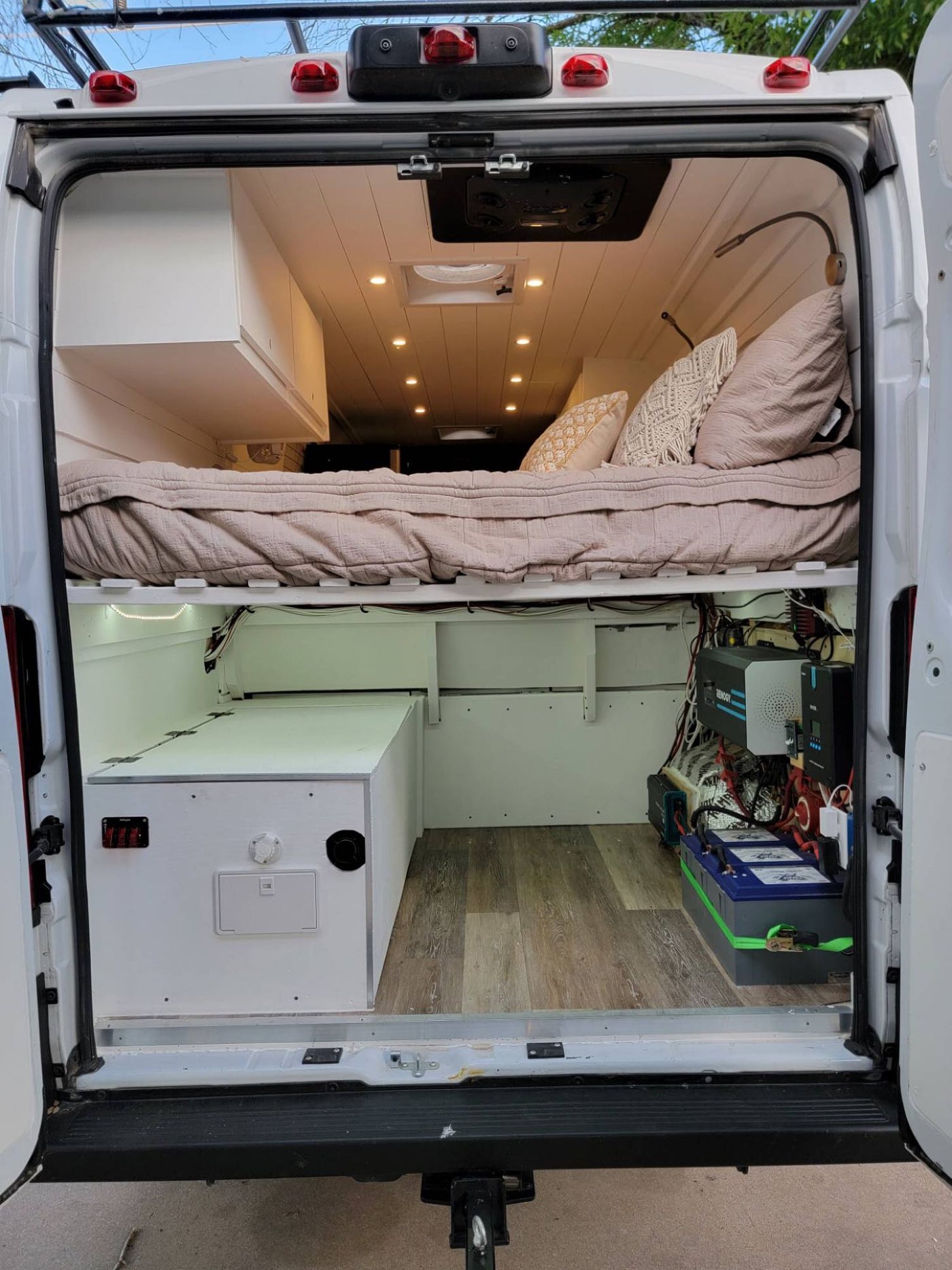  and fire pit.|This white RV rental van — photo 8
