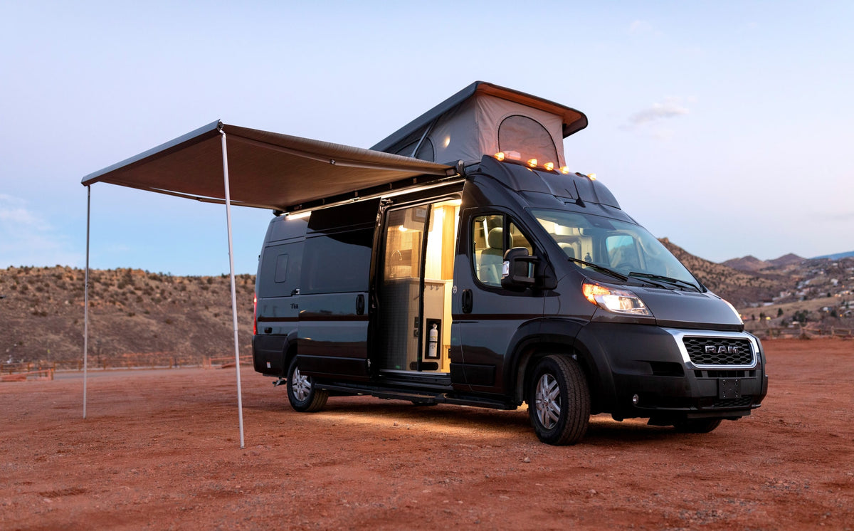 Dark grey camper van RV rental at dusk