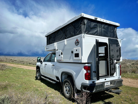 Overland Explorer Vehicles Camp-X Truck Camper on Chevy Silverado overland rental