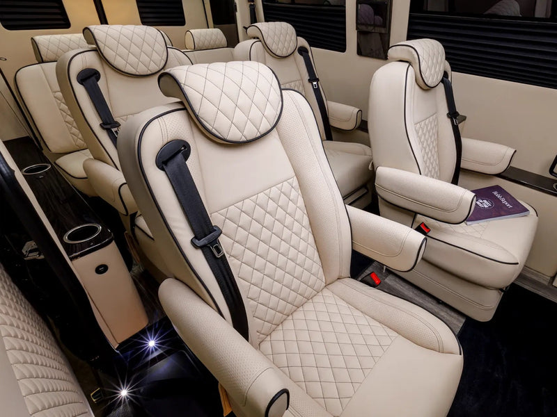  and chic amenities for comfortable travel.|Experience luxury travel in this cozy RV rental sleeping area — photo 13