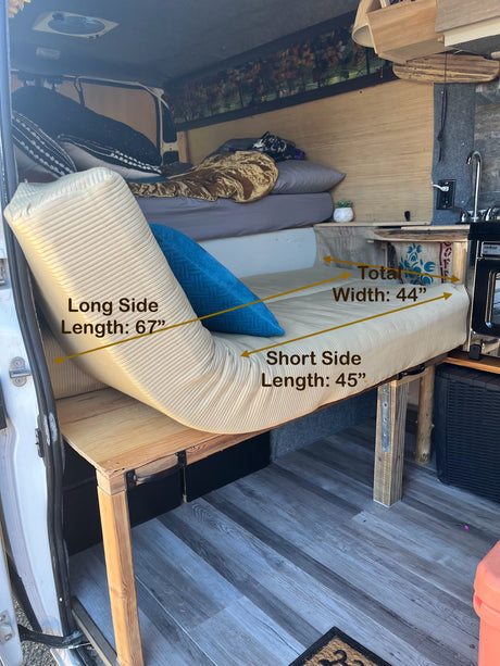 RV rental: Van conversion interior with a modular bed (67" long, 44" wide) & compact kitchen. Optimized for travel.