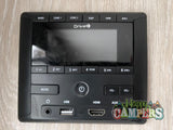 An RV rental multimedia control panel with audio, display, and input options (USB, HDMI, AUX) for your journey.