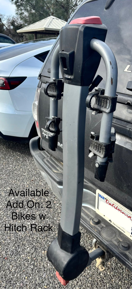 Available RV rental add-on: a 2-bike hitch rack on a truck's rear. Perfect for carrying bikes on your next adventure.