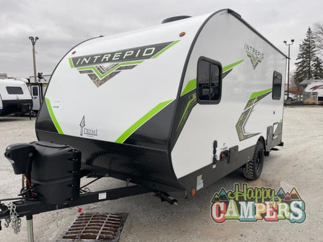 Front view of a white & black Intrepid travel trailer RV with bold lime green accents, ideal for rv rental adventures.