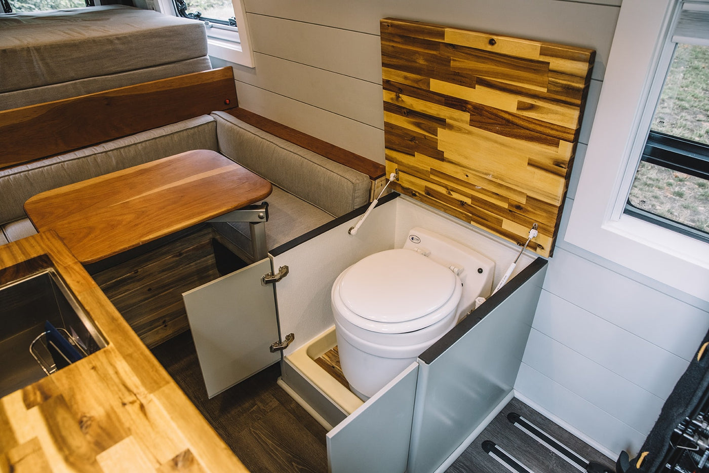  and a swiveled front seat.|Explore this RV rental's interior: comfy front seats — photo 14