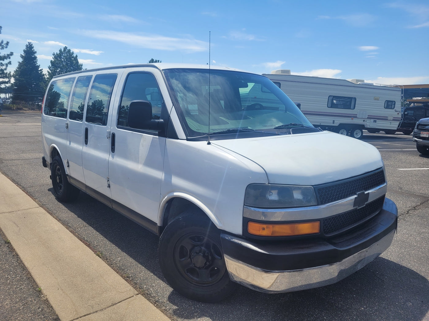  showing rear seats and view of RVs outside — photo 8