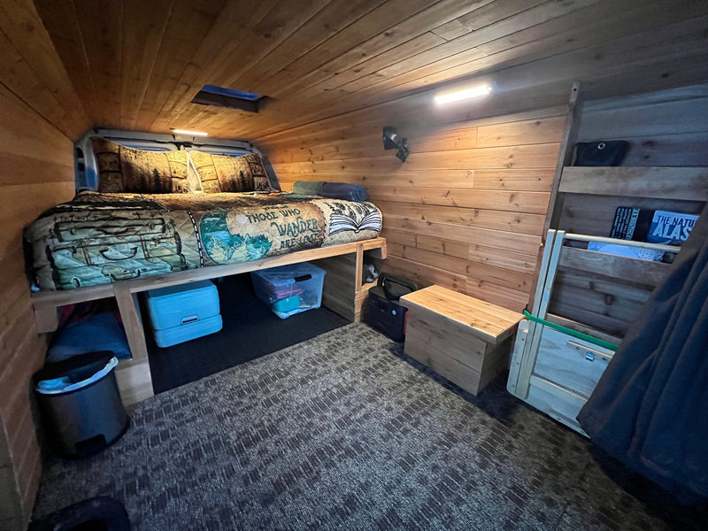  and smart storage solutions.|This RV rental photo shows camping kitchen & cleaning essentials: stove — photo 8