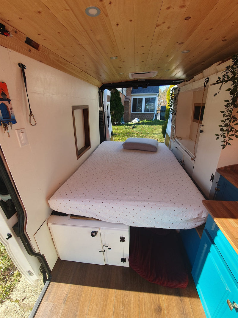  and comfortable living space.|Cozy RV rental interior with a Netflix projector setup — photo 8