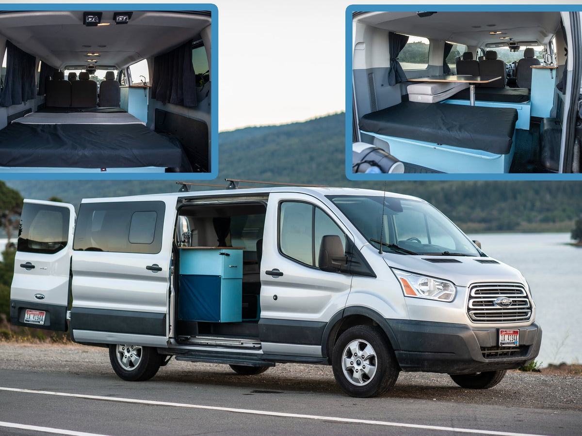 Silver RV rental Ford Transit camper van. Inside: convertible bed