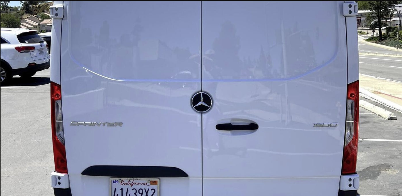 Rear view of a white Mercedes-Benz Sprinter 1500 van, popular for RV rental and conversions. — photo 5