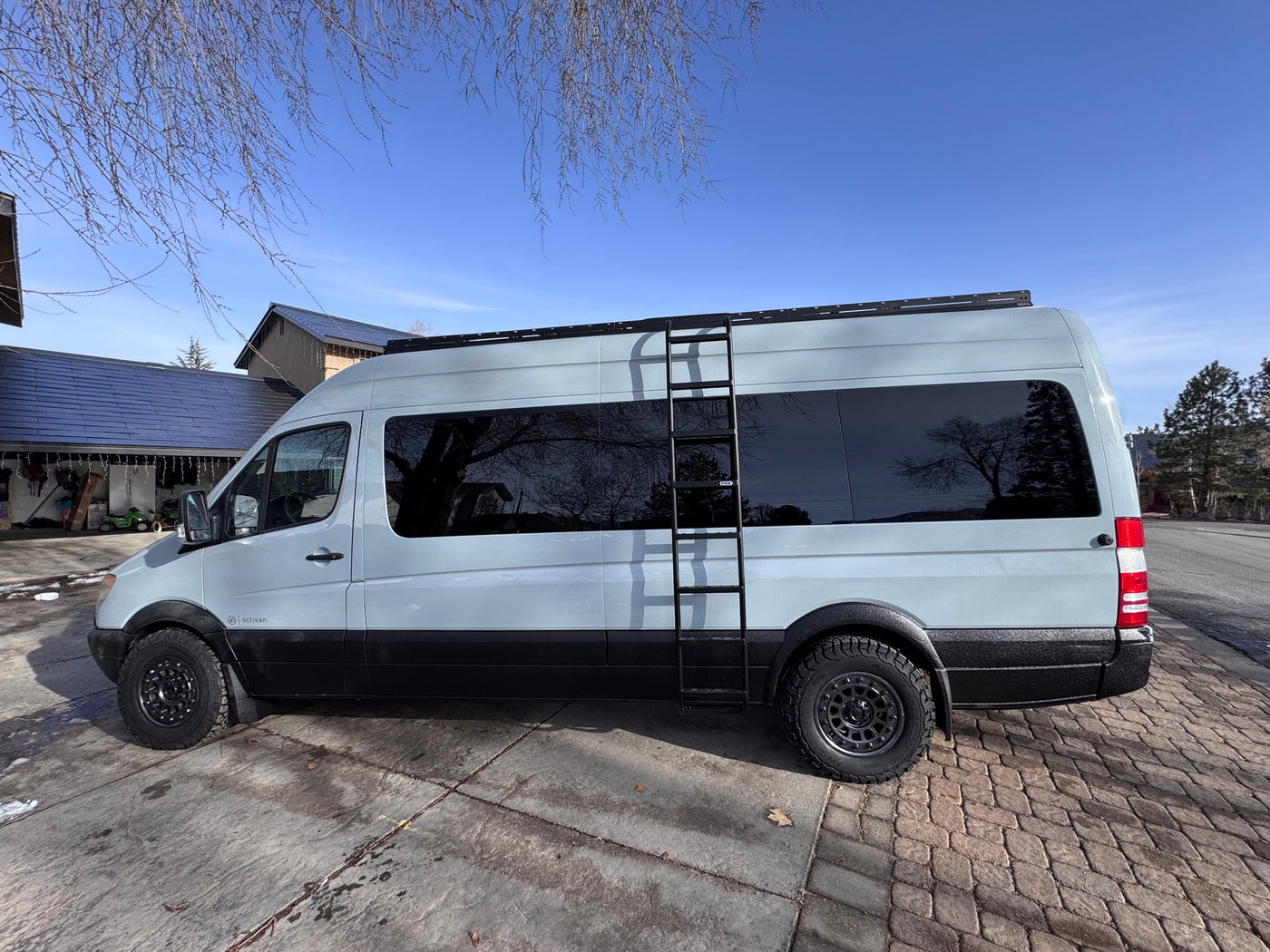  and comfortable seating.|This adventure-ready rv rental shows a bed — photo 11