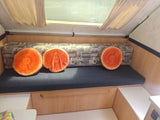  and storage areas.|Inside a cozy RV rental camper