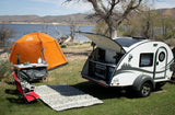 Perfect RV rental getaway: Teardrop camper, tent, outdoor kitchen set up for lakeside camping.