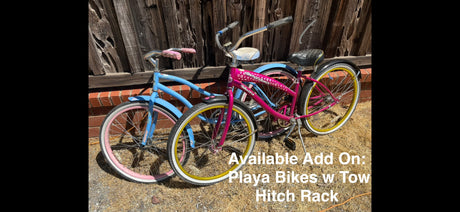Available RV rental add-on: two colorful Playa bikes with a tow hitch rack. Perfect for your outdoor adventures.