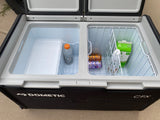 Open Dometic CFX portable cooler/fridge, ideal for an rv rental, showcasing drinks like milk, La Croix, and Gatorade.